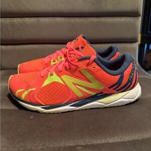 Women’s New Balance Neon Pink/Yellow racing shoes Size 8.5